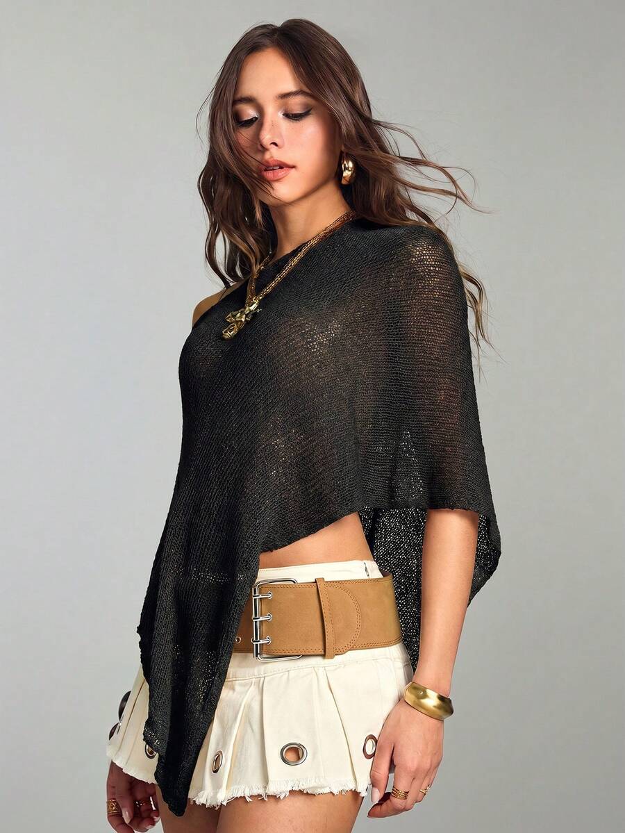 Women's casual hollow knit poncho top with boat neck, cloak sleeves, and asymmetrical hem