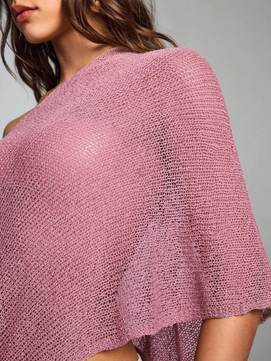 Women's casual hollow knit poncho top with boat neck, cloak sleeves, and asymmetrical hem