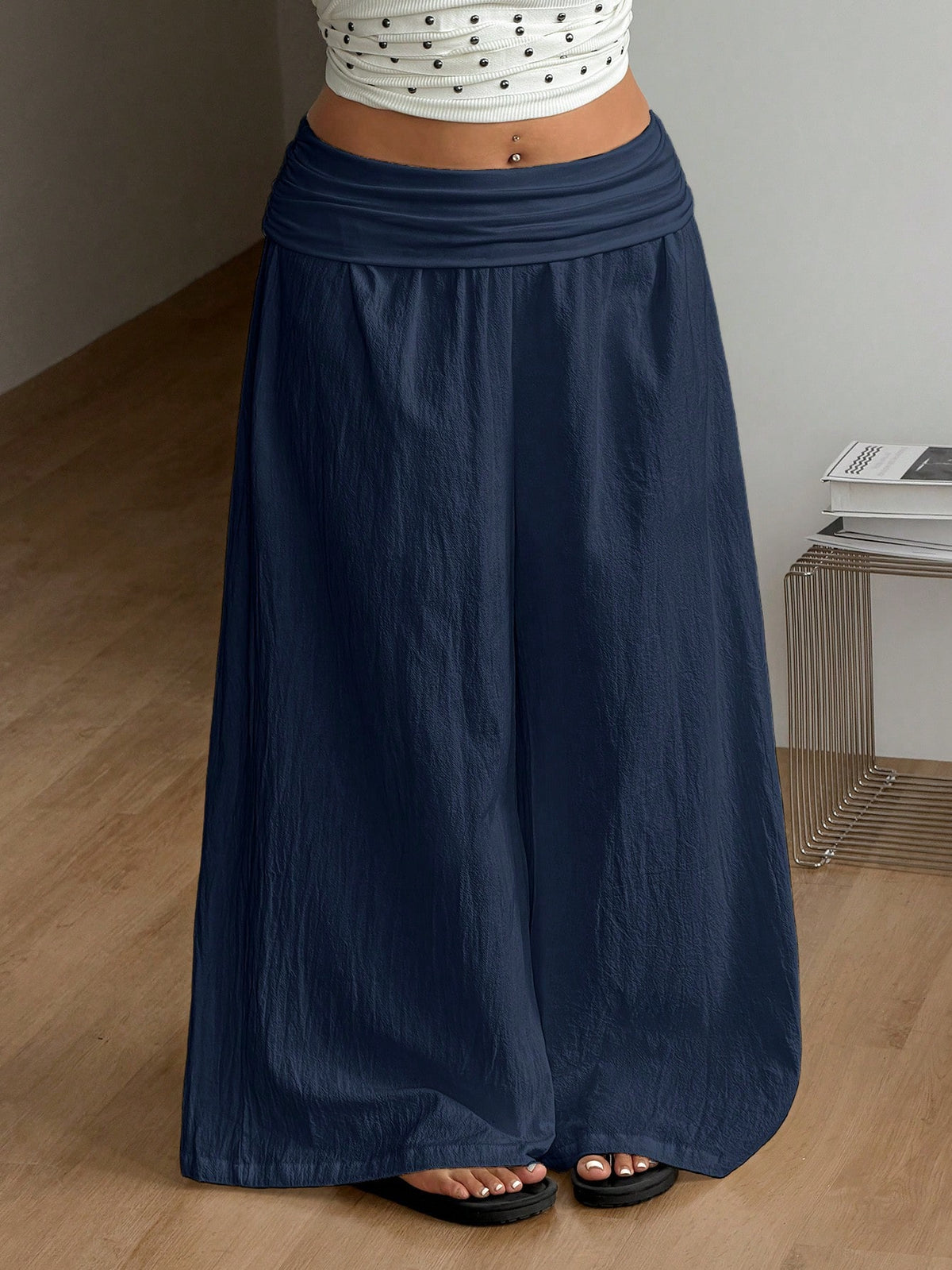 Women's plus size wide leg cotton pants featuring a relaxed loose fit and high waist design.