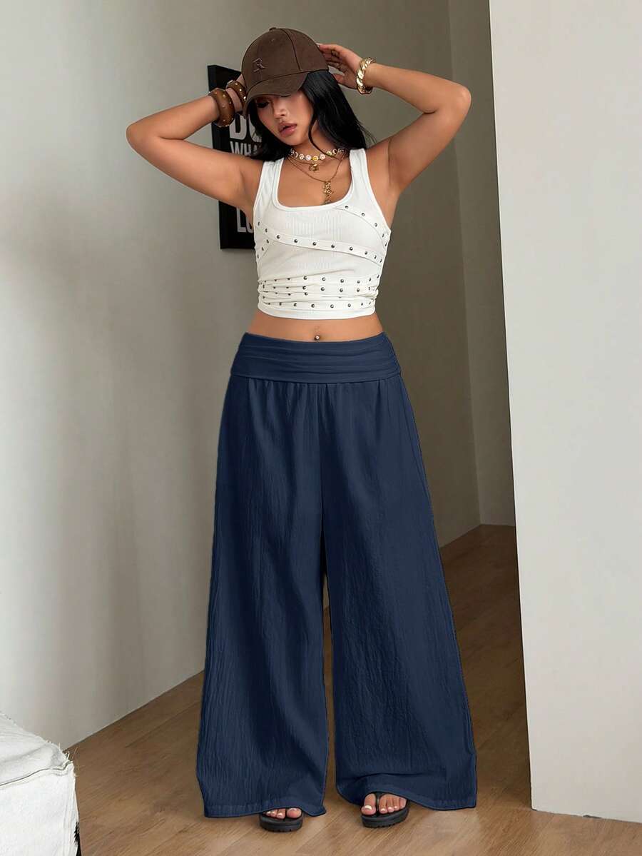 Women's plus size wide leg cotton pants featuring a relaxed loose fit and high waist design.