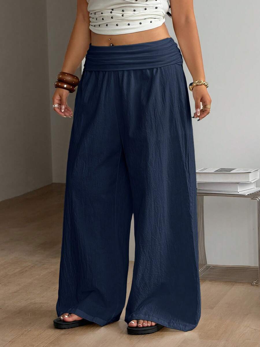 Women's plus size wide leg cotton pants featuring a relaxed loose fit and high waist design.