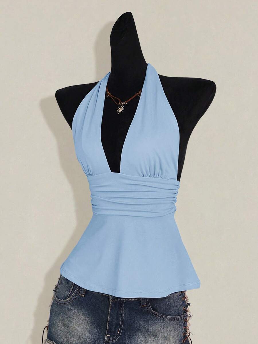 Women's backless halter babydoll tank top featuring a square neckline, slim fit silhouette, and a flared ruffle hem.