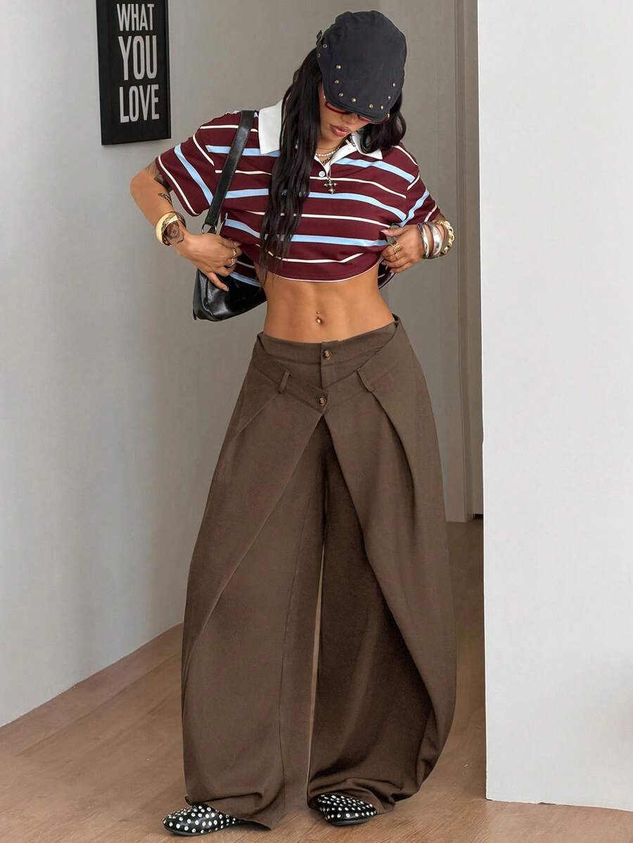 Women's loose fit pleated wide leg pants in royal blue pinstripe woven fabric with zipper fly closure.