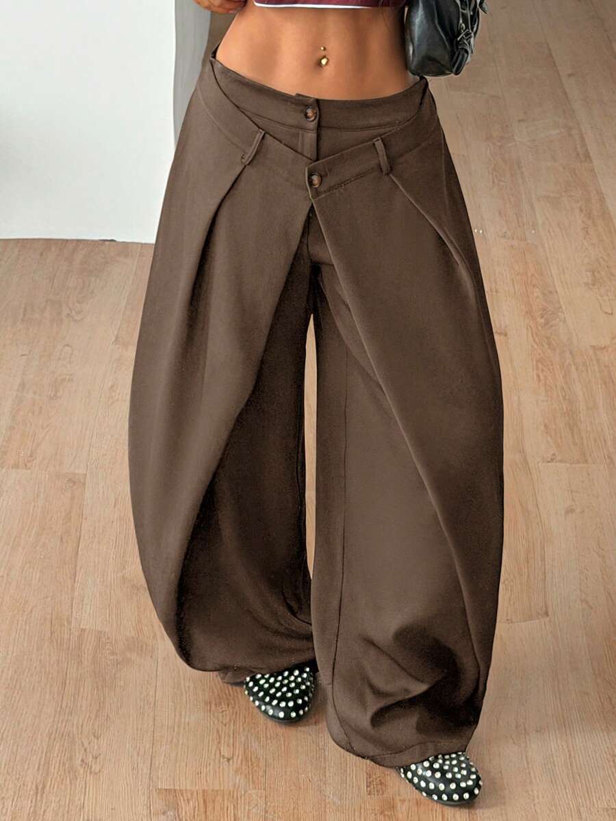 Women's loose fit pleated wide leg pants in royal blue pinstripe woven fabric with zipper fly closure.