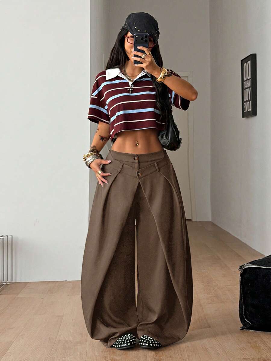 Women's loose fit pleated wide leg pants in royal blue pinstripe woven fabric with zipper fly closure.