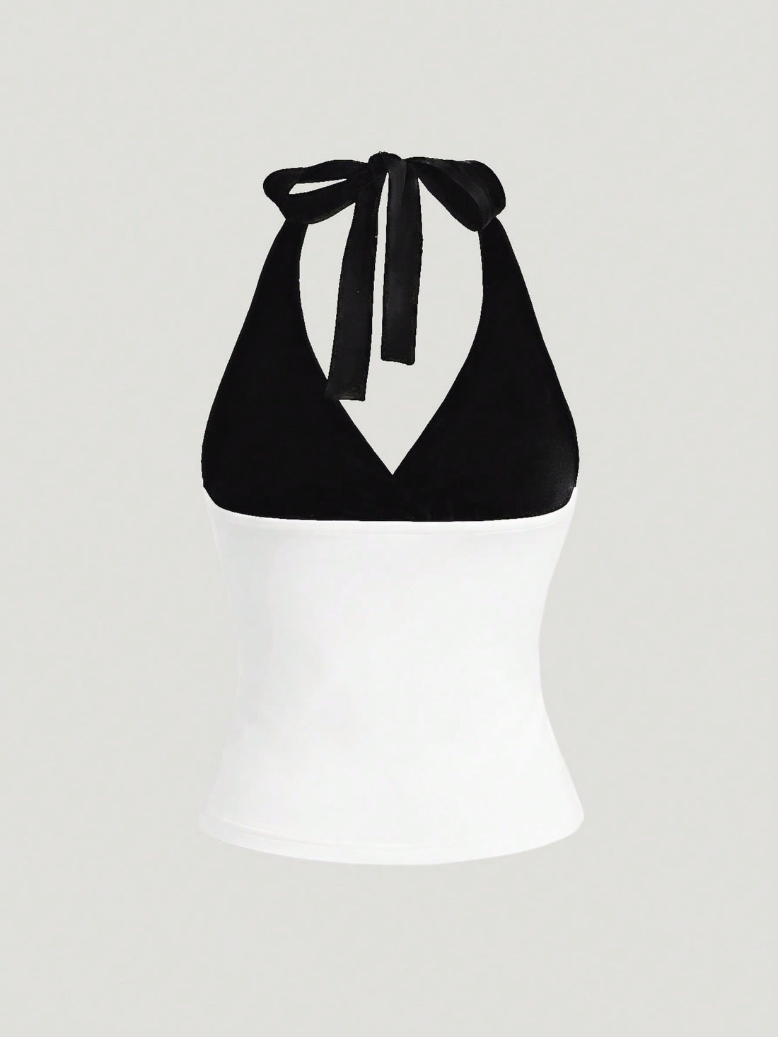 Women's black and white halter neck tank top with ladybug and daisy decor, geometric pattern, ruched front, knot detail, and backless design.