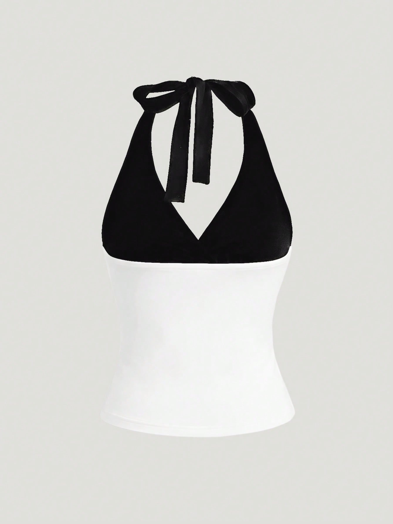 Women's black and white halter neck tank top with ladybug and daisy decor, geometric pattern, ruched front, knot detail, and backless design.