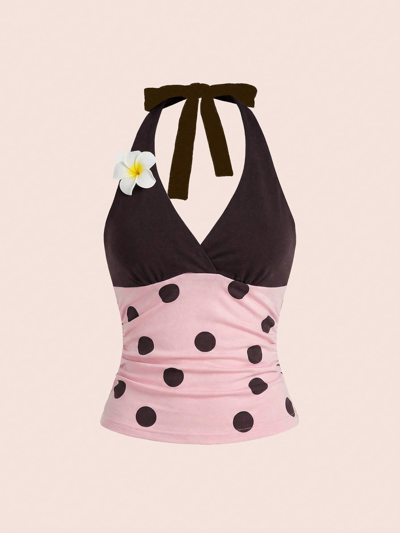 Women's black and white halter neck tank top with ladybug and daisy decor, geometric pattern, ruched front, knot detail, and backless design.