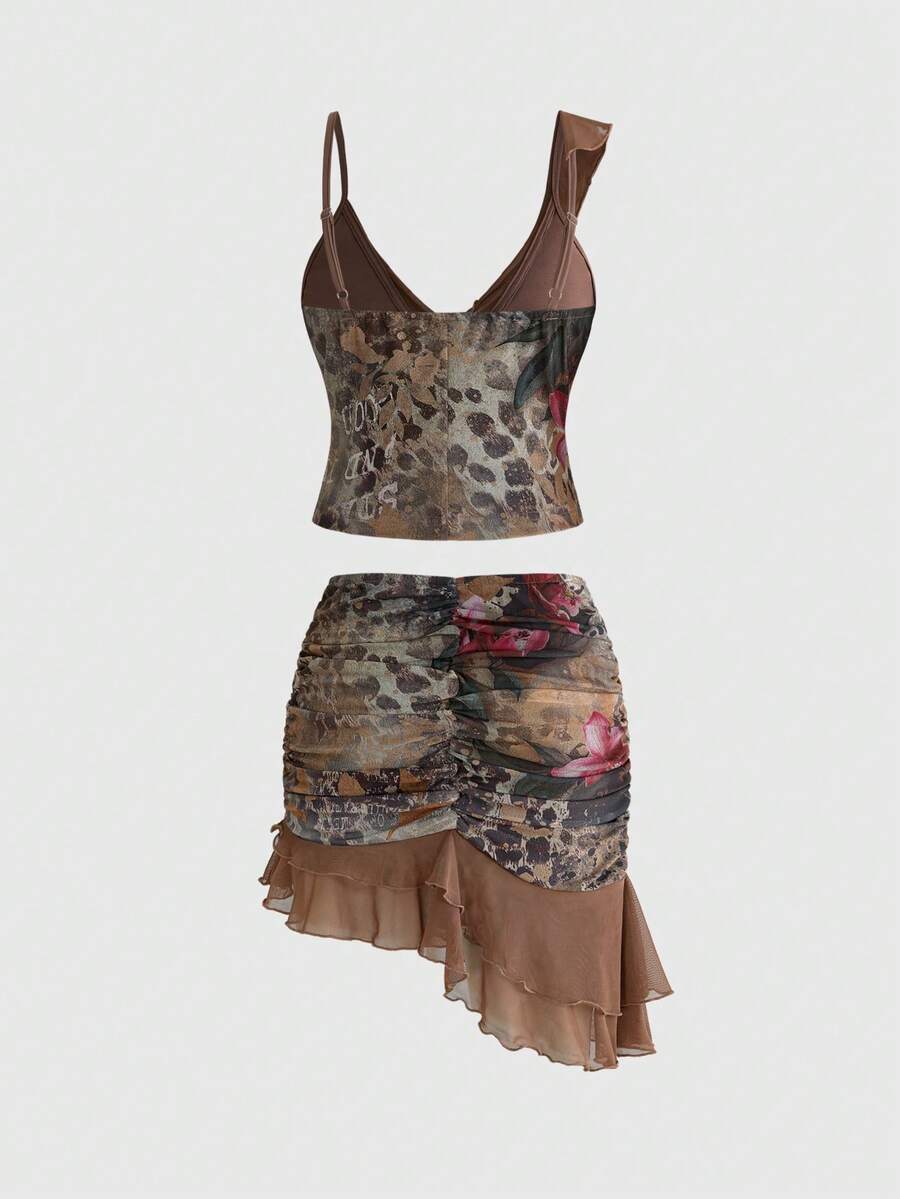 Women's brown two-piece set featuring a ruched camisole top with ruffle hem and asymmetrical neck alongside a plant print mini skirt.
