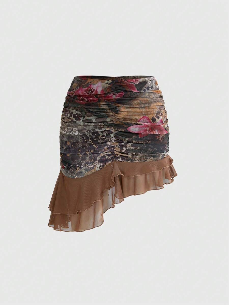 Women's brown two-piece set featuring a ruched camisole top with ruffle hem and asymmetrical neck alongside a plant print mini skirt.