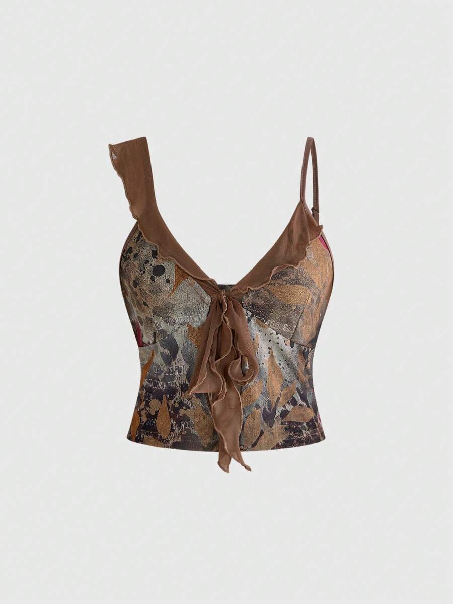 Women's brown two-piece set featuring a ruched camisole top with ruffle hem and asymmetrical neck alongside a plant print mini skirt.
