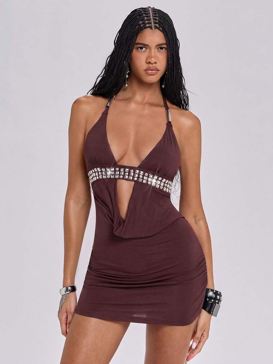 Women's slim fit halter neck bodycon mini dress featuring a backless design with knot tie back details.