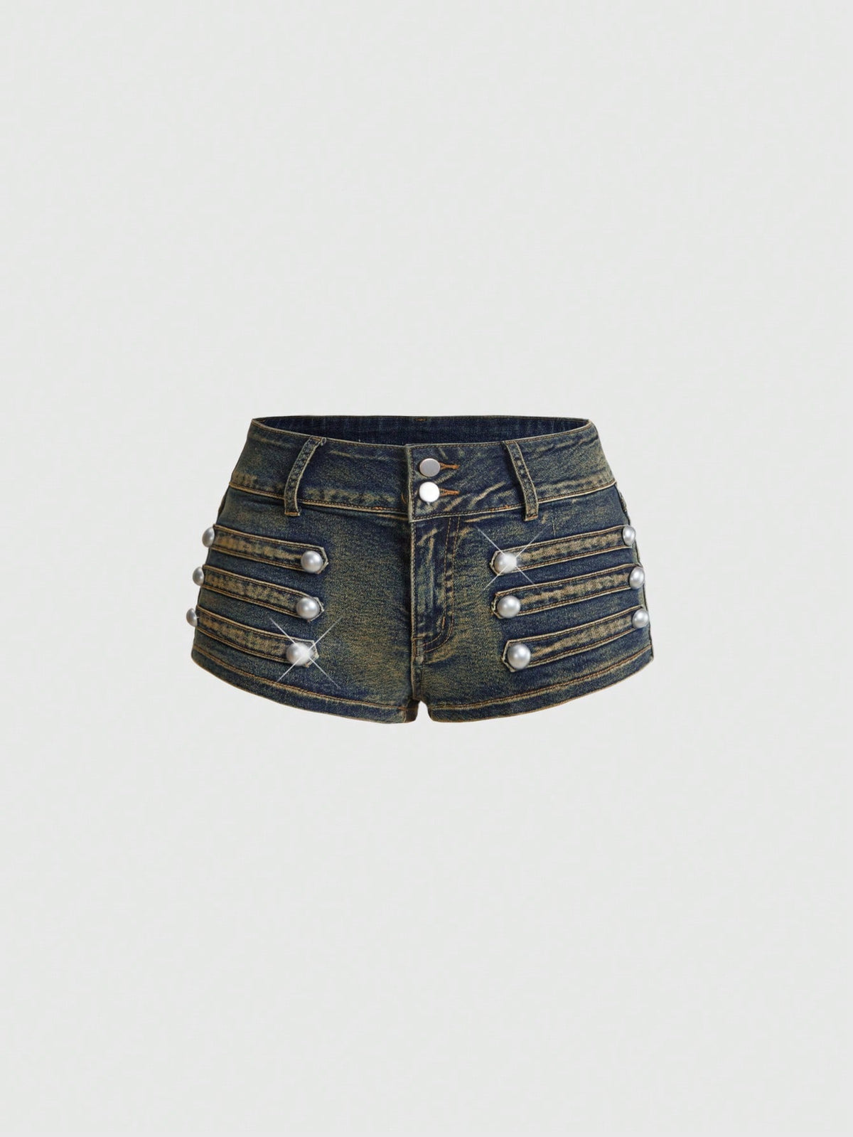 Front view of women's ultra low waist denim mini shorts with double metal button accents and zipper fly
