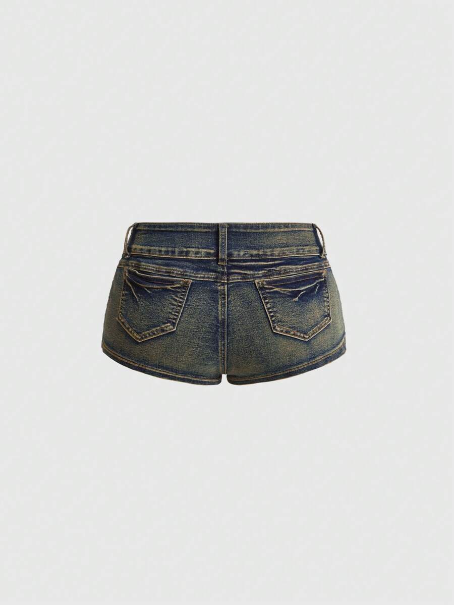 Front view of women's ultra low waist denim mini shorts with double metal button accents and zipper fly
