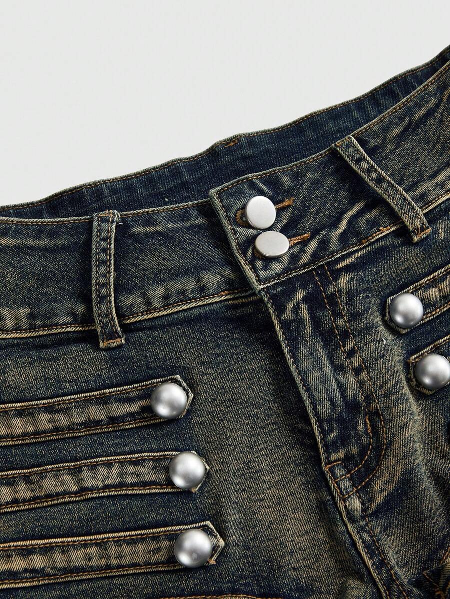 Front view of women's ultra low waist denim mini shorts with double metal button accents and zipper fly