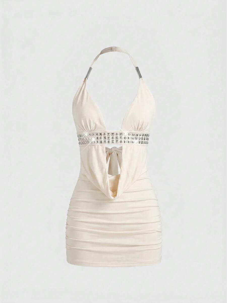 Women's slim fit halter neck bodycon mini dress featuring a backless design with knot tie back details.