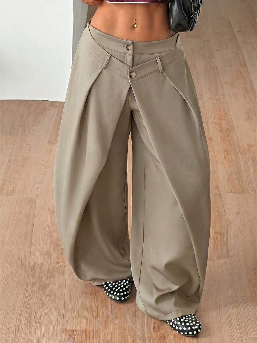 Women's loose fit pleated wide leg pants in royal blue pinstripe woven fabric with zipper fly closure.