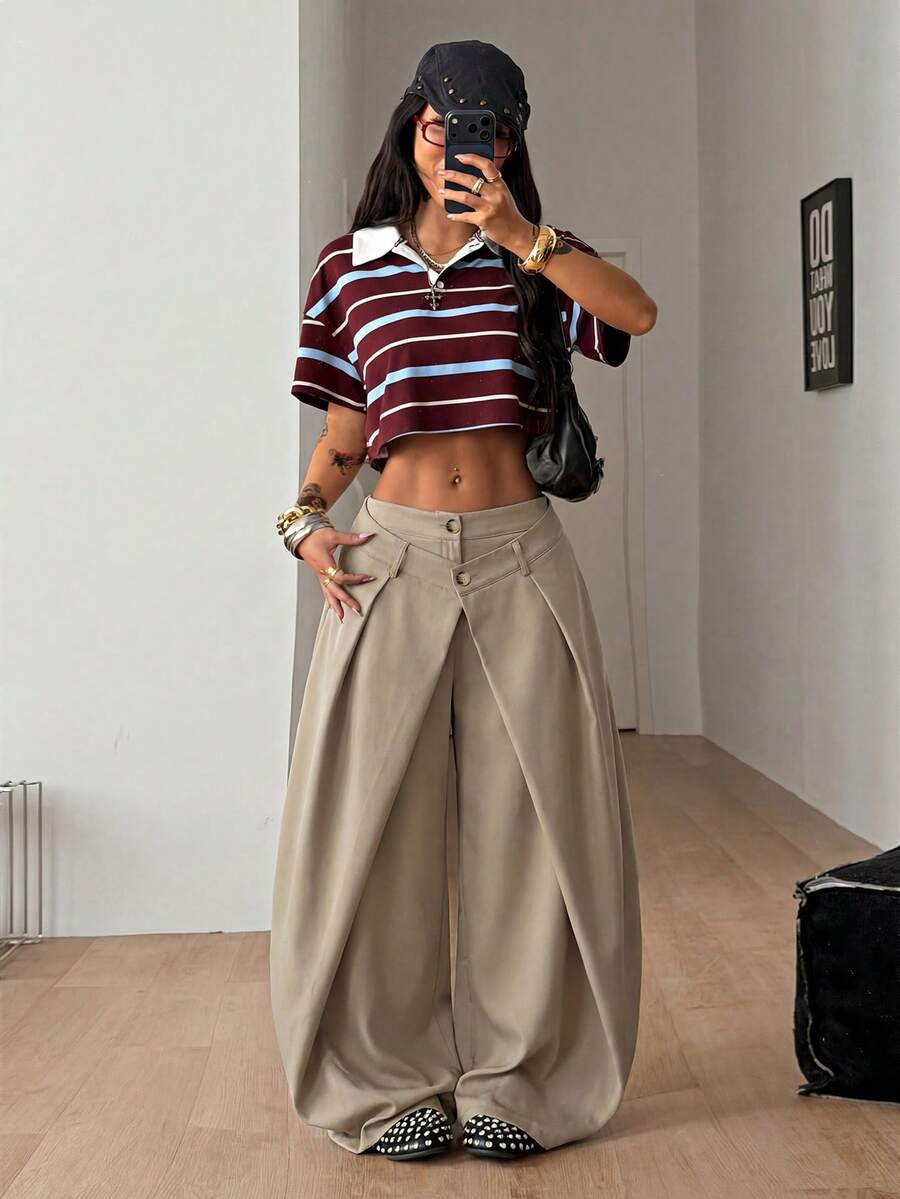 Women's loose fit pleated wide leg pants in royal blue pinstripe woven fabric with zipper fly closure.