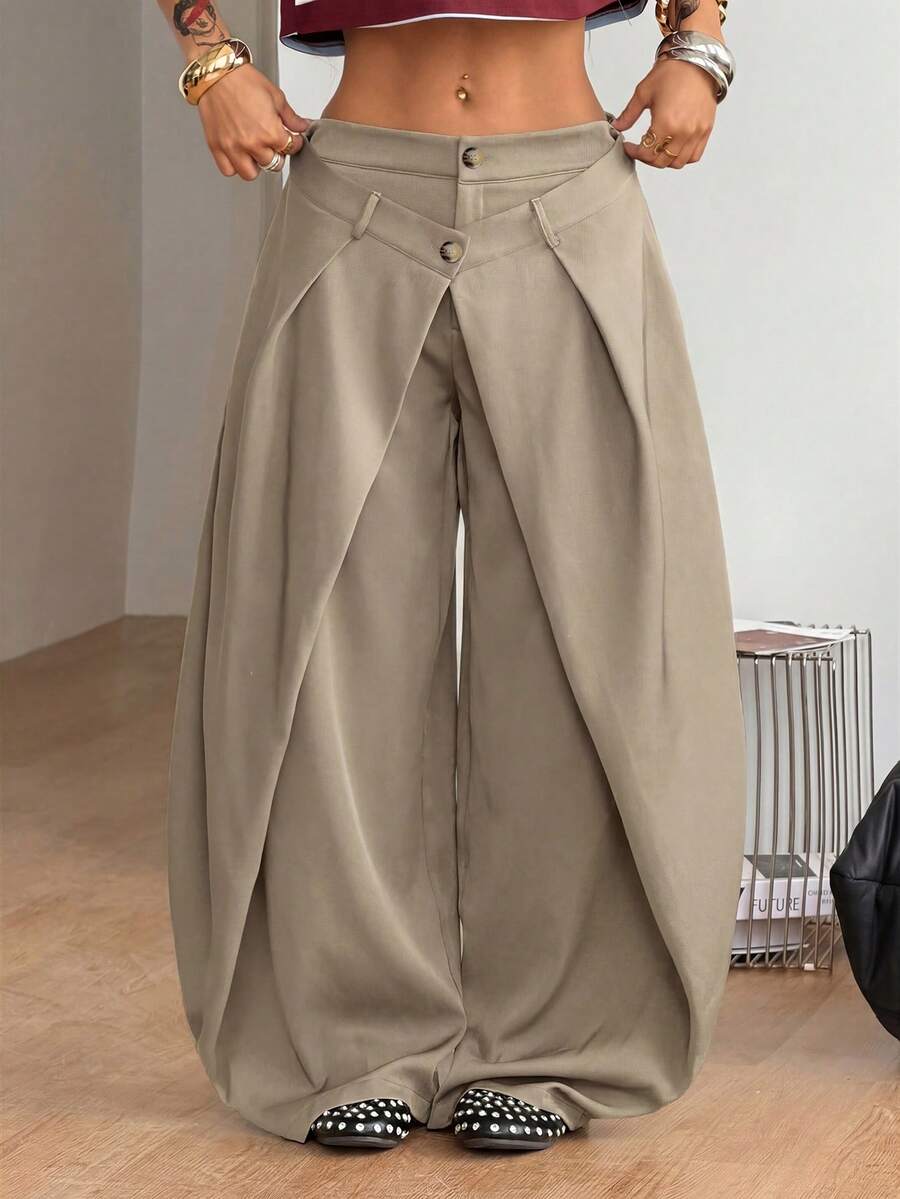 Women's loose fit pleated wide leg pants in royal blue pinstripe woven fabric with zipper fly closure.