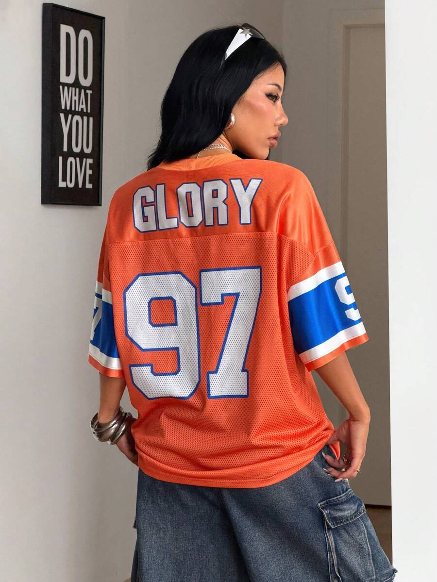 Women's oversized mesh jersey t-shirt with sporty number print, short drop-shoulder sleeves, and V-neckline.