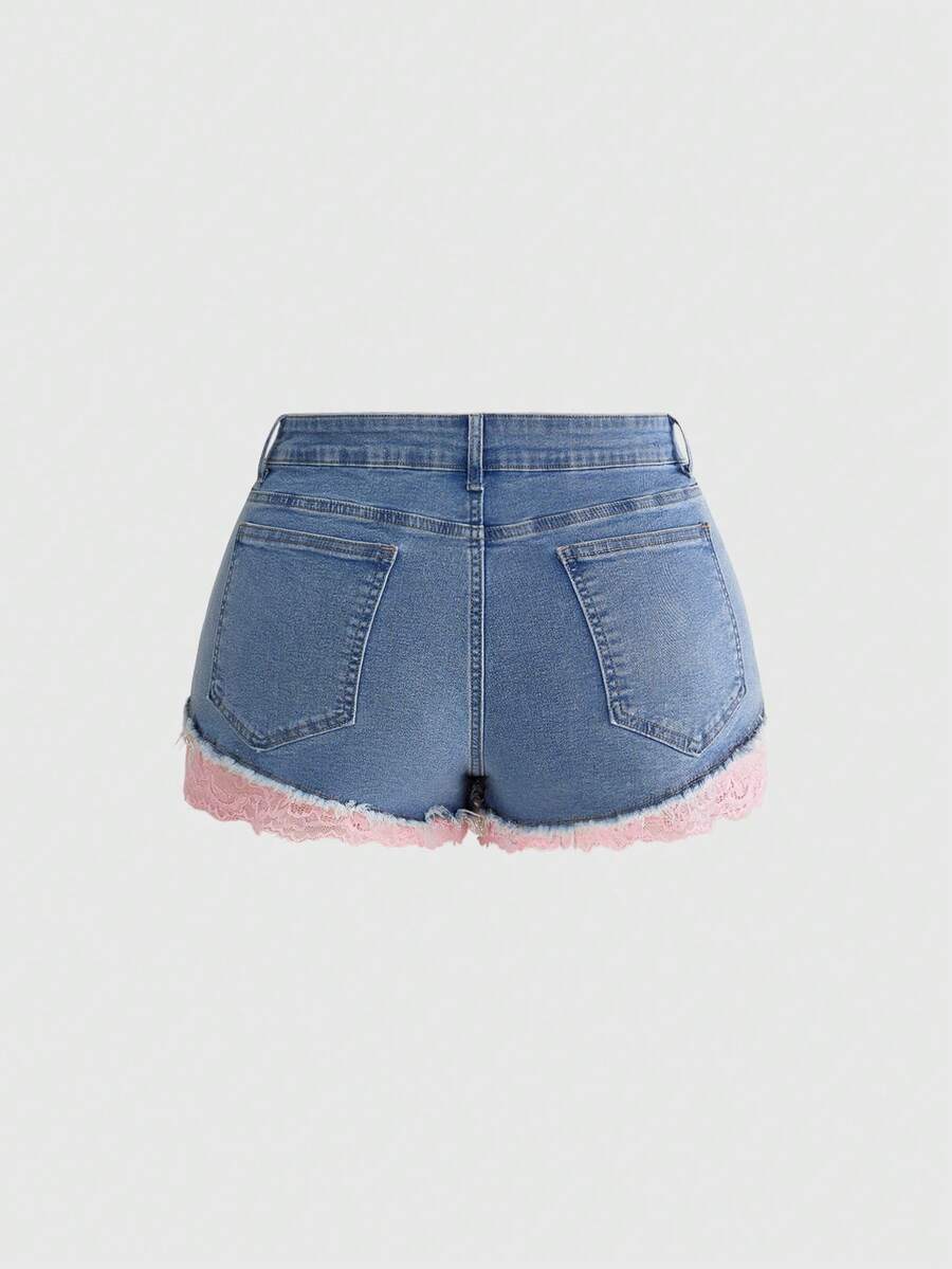 Front view of women's plus size skinny denim shorts featuring lace patchwork detailing, mid-rise waist, button zipper closure, and classic pockets.
