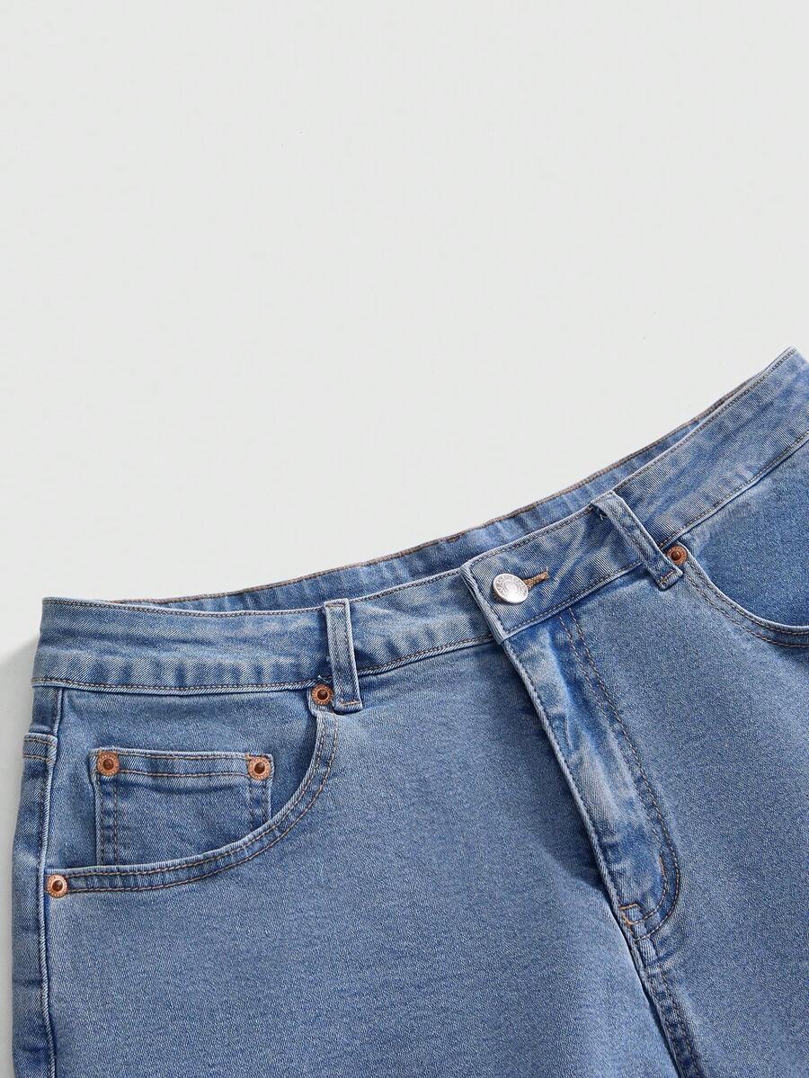 Front view of women's plus size skinny denim shorts featuring lace patchwork detailing, mid-rise waist, button zipper closure, and classic pockets.
