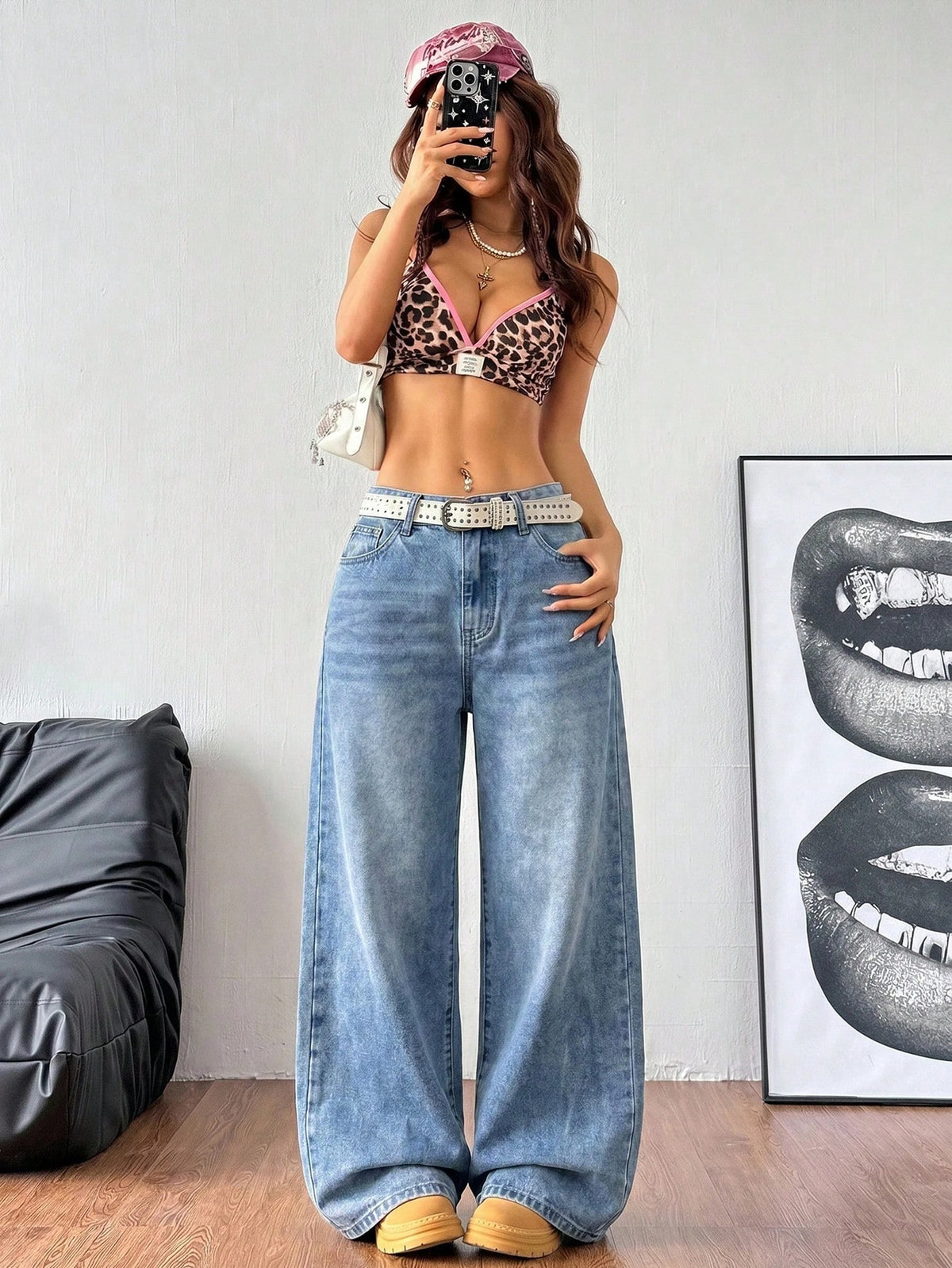 Women's loose wide-leg jeans in light wash denim with low waist and extra-long relaxed fit