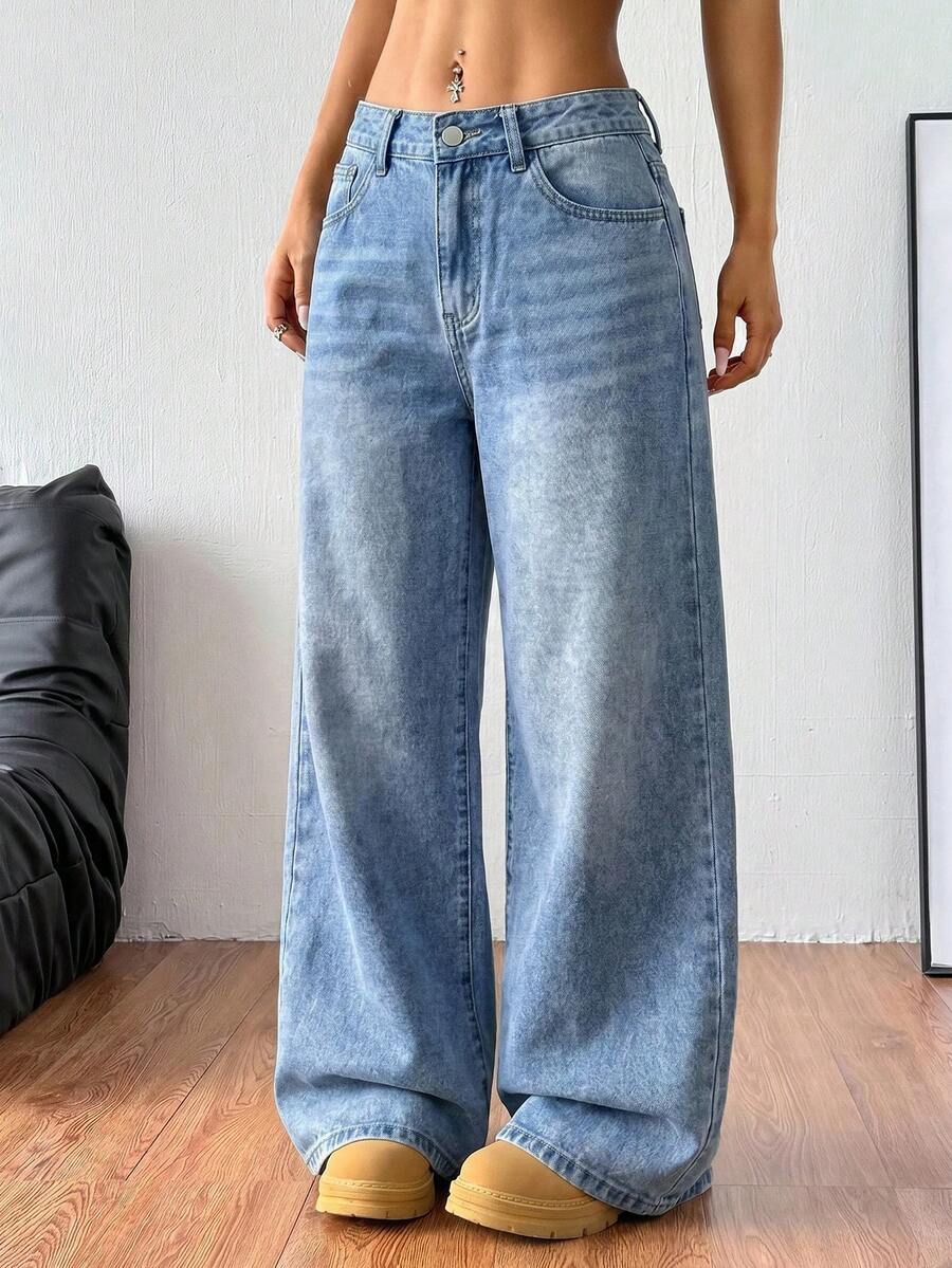 Women's loose wide-leg jeans in light wash denim with low waist and extra-long relaxed fit