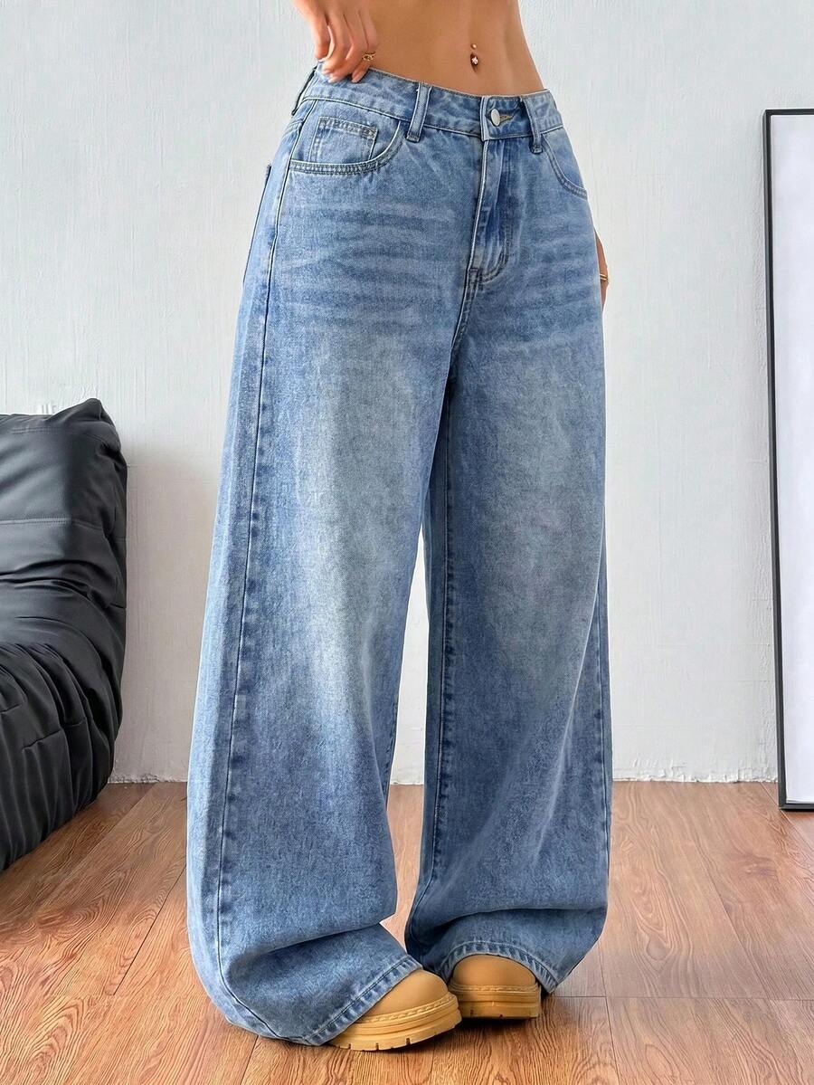 Women's loose wide-leg jeans in light wash denim with low waist and extra-long relaxed fit