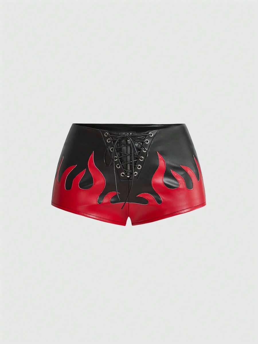 Punk ultra low waist skinny PU mini shorts with flame embroidery, rhinestone details, zipper fly closure, and a graphic Halloween-inspired festival style.