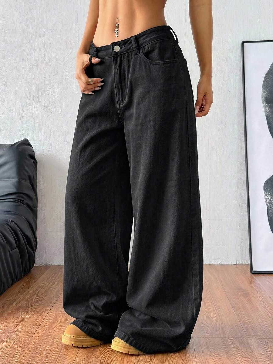 Women's casual loose fit wide leg denim jeans with functional pockets and low waist design.