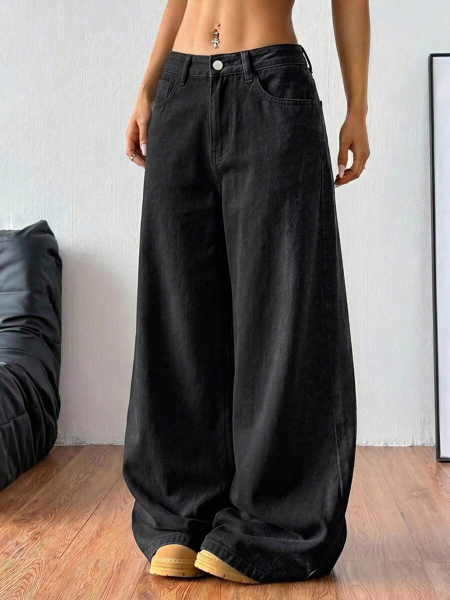 Women's casual loose fit wide leg denim jeans with functional pockets and low waist design.