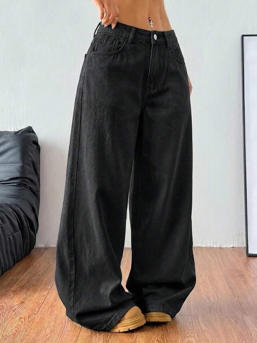 Women's casual loose fit wide leg denim jeans with functional pockets and low waist design.