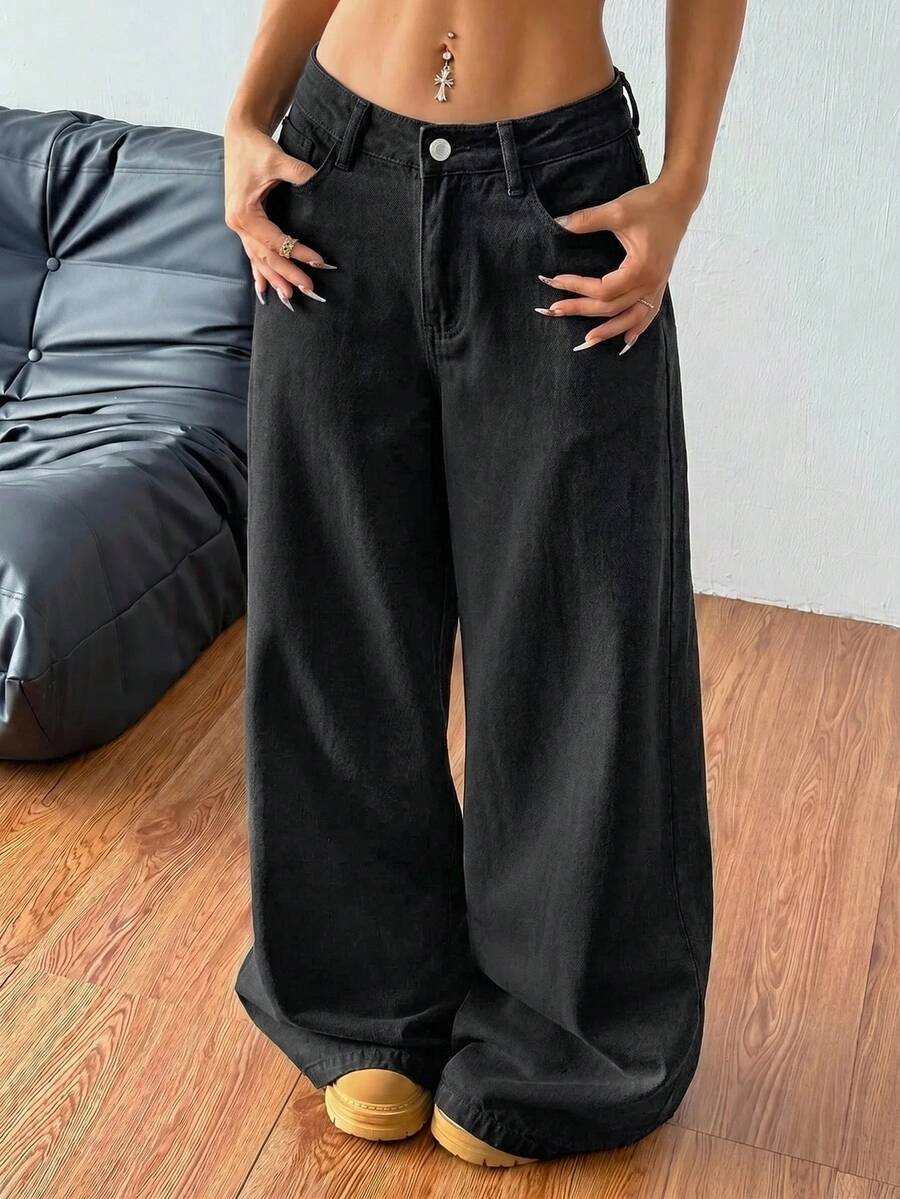 Women's casual loose fit wide leg denim jeans with functional pockets and low waist design.
