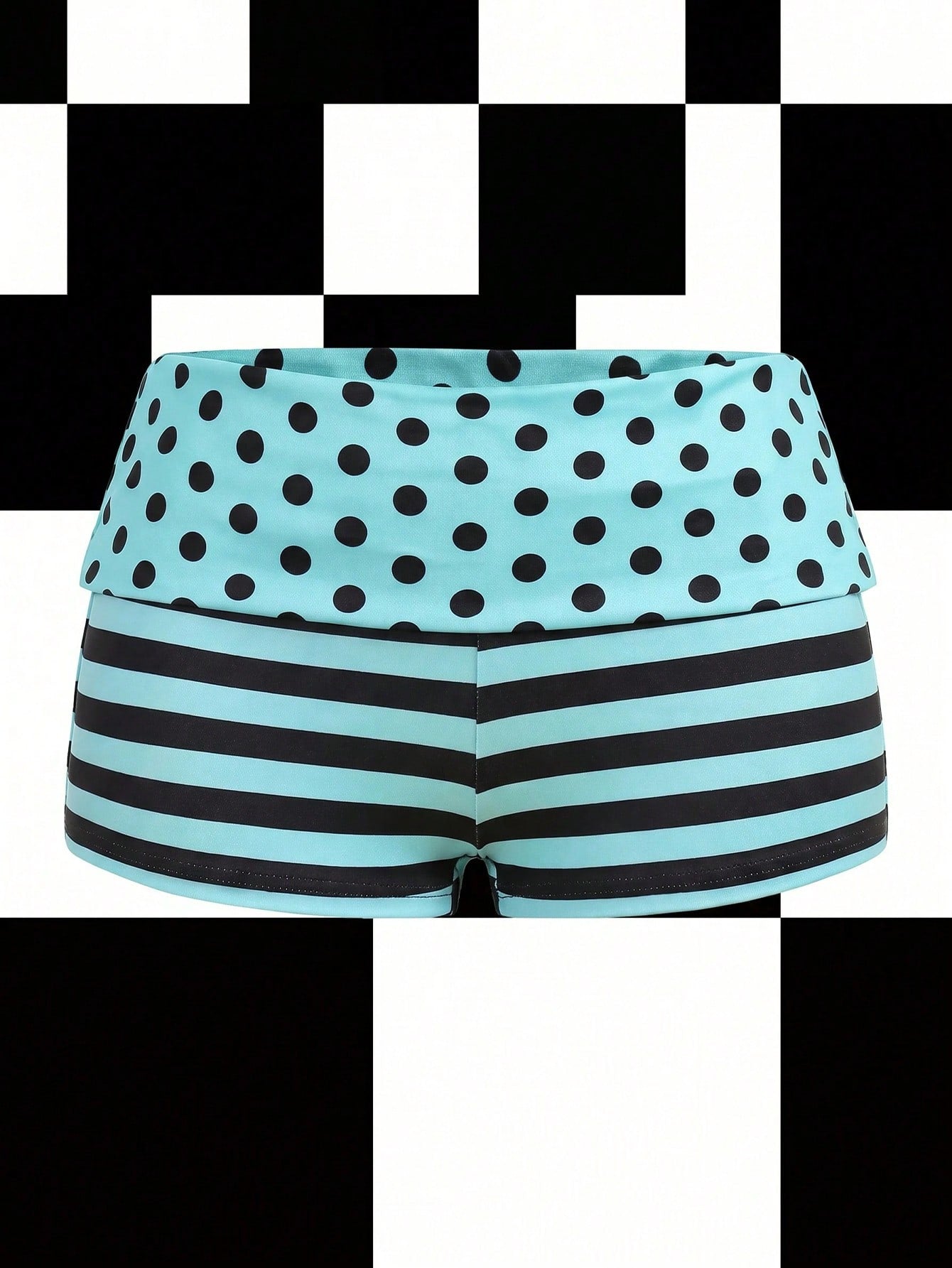Women's black low waist mini track shorts with contrast polka dot, striped, geometric, and plant-inspired print details, elastic waistband, and skinny fit