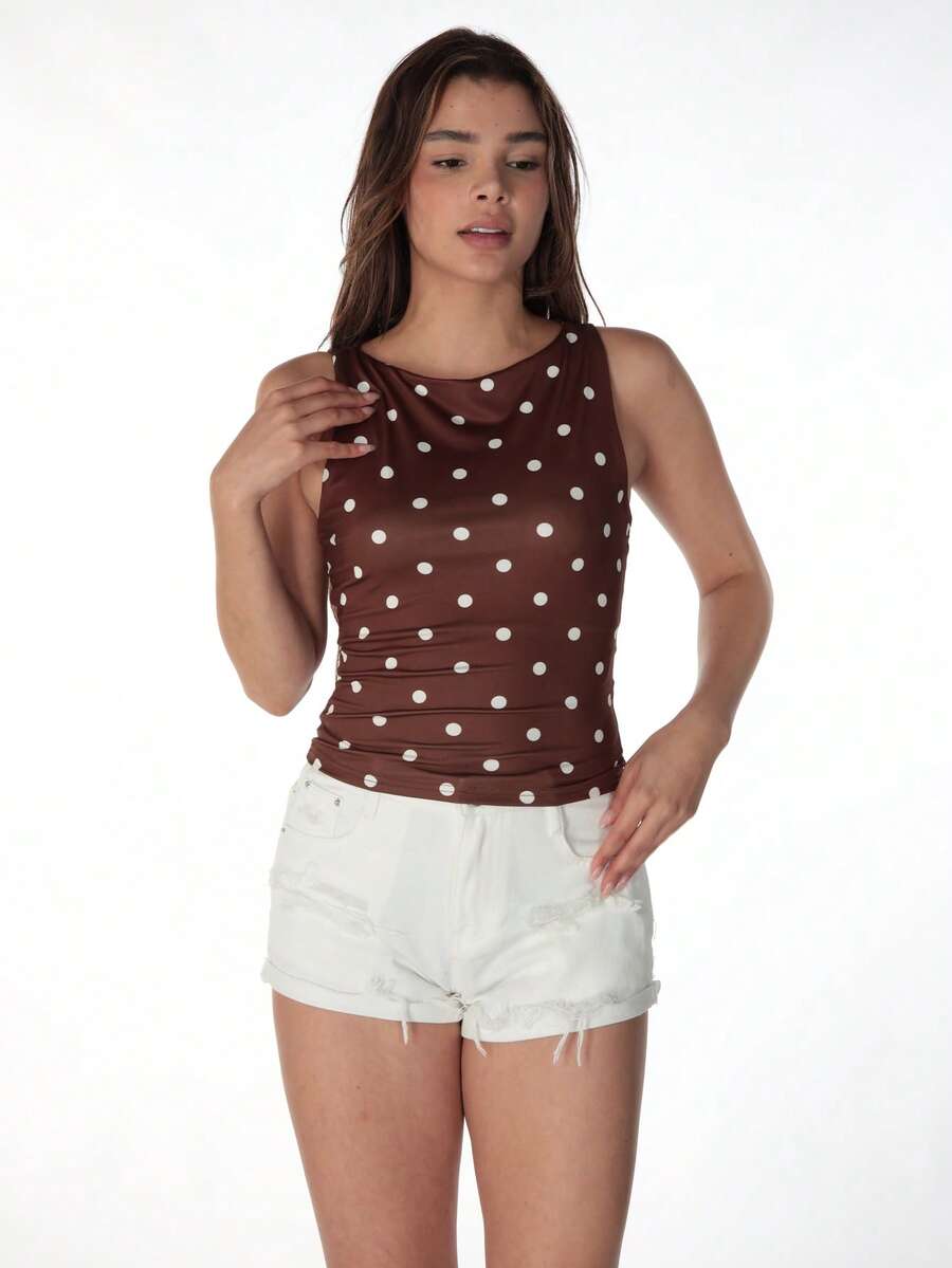 Women's polka dot sleeveless tank top with round neck, ruched rib-knit detail, regular hem, and slim fit casual style