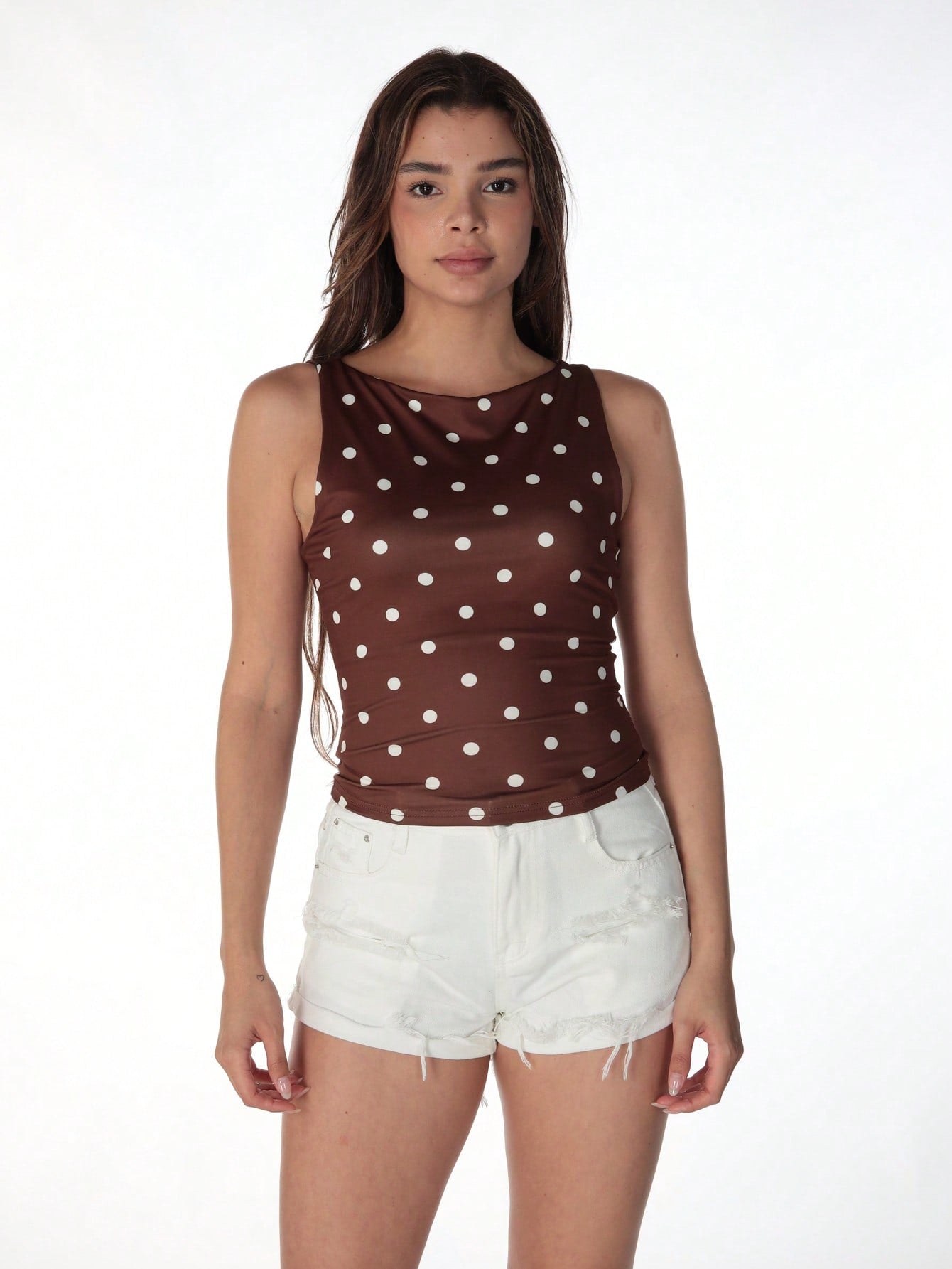 Women's polka dot sleeveless tank top with round neck, ruched rib-knit detail, regular hem, and slim fit casual style
