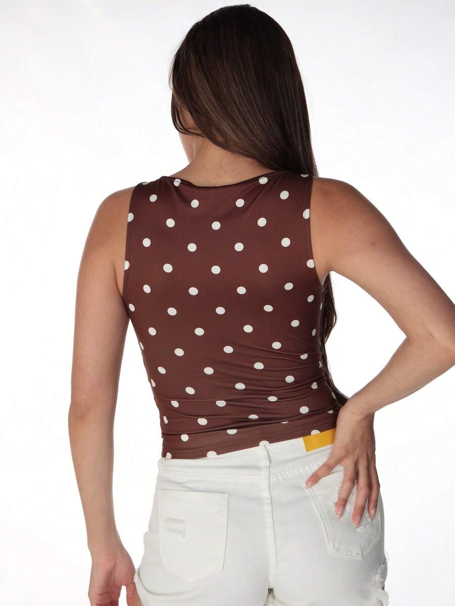 Women's polka dot sleeveless tank top with round neck, ruched rib-knit detail, regular hem, and slim fit casual style