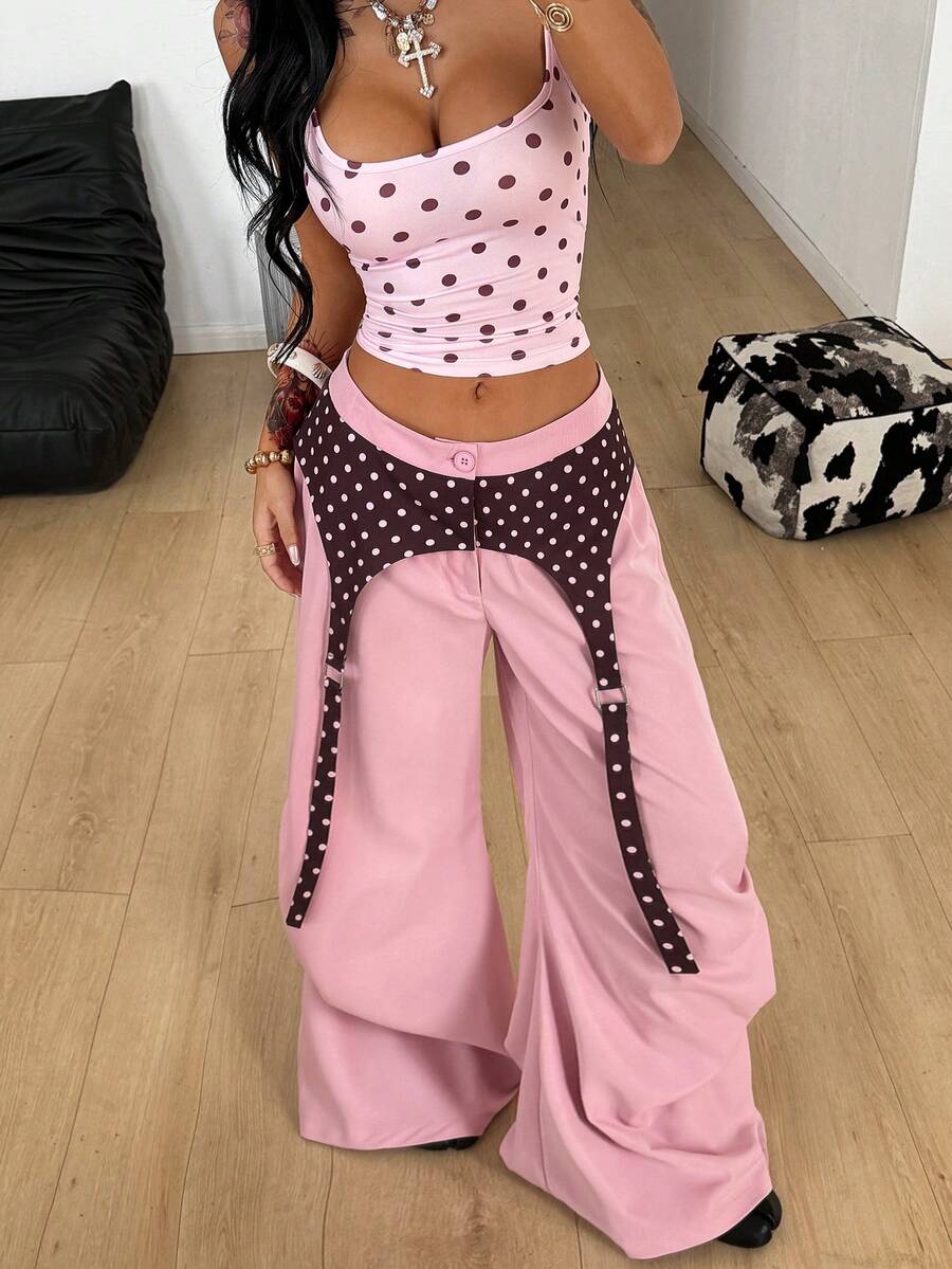 Women's brown baggy parachute pants with polka dot graphic print, low waist, and loose streetwear fit