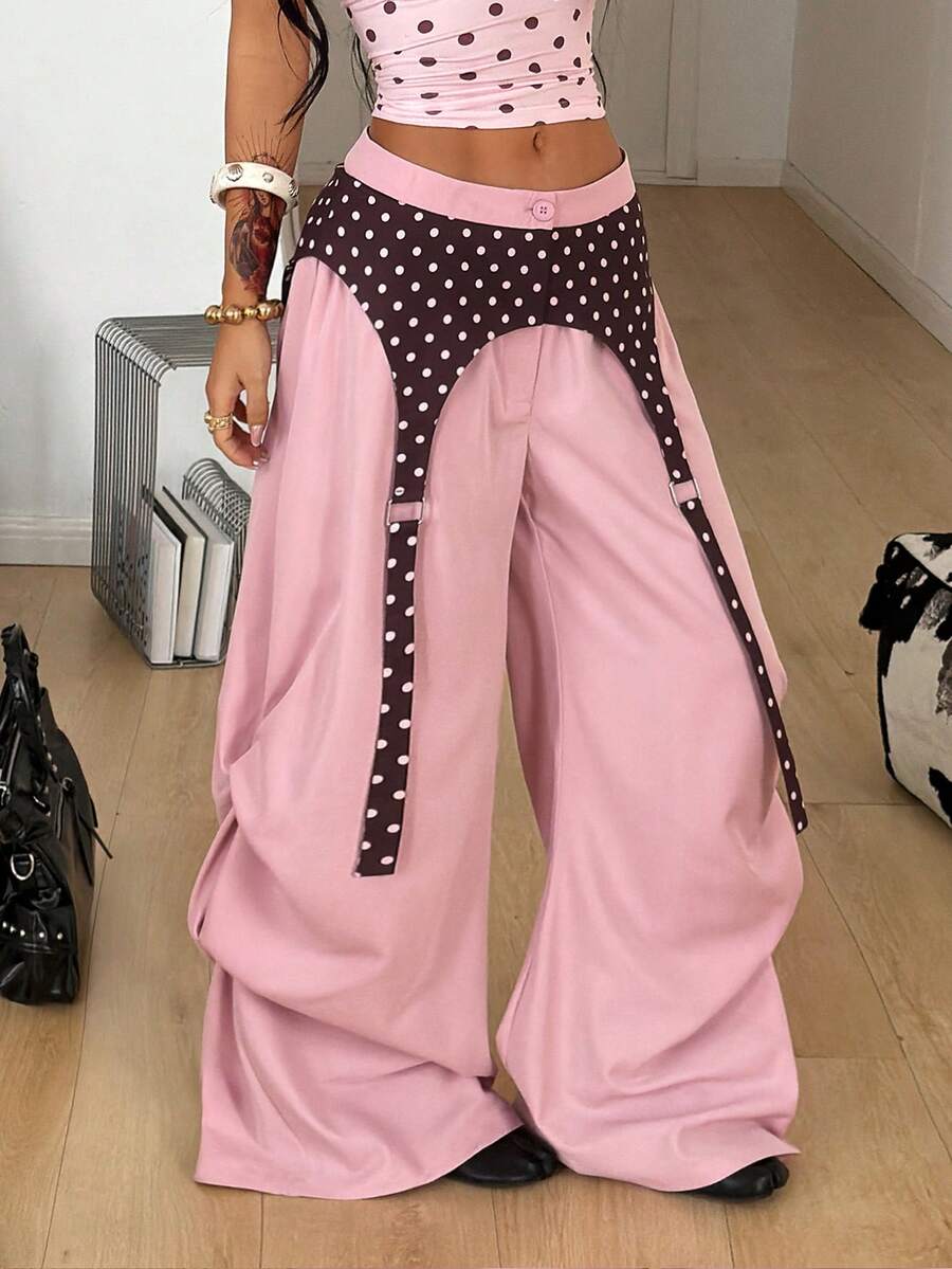 Women's brown baggy parachute pants with polka dot graphic print, low waist, and loose streetwear fit