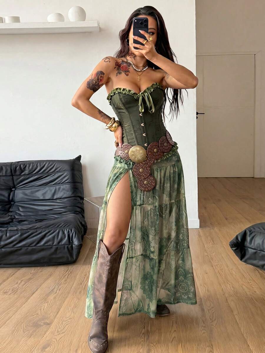 Women's low rise flared long skirt featuring an all-over print, split thigh accent, and textured semi-sheer fabric.