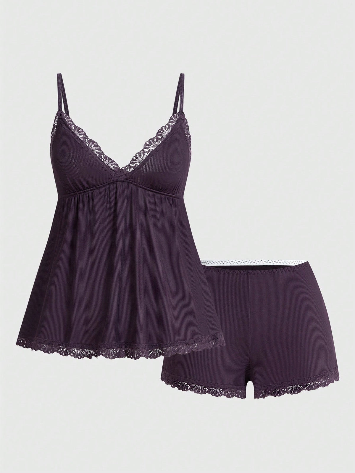 Ribbed lace camisole and shorts pajama set with spaghetti straps, bow detail, and contrast lace trim