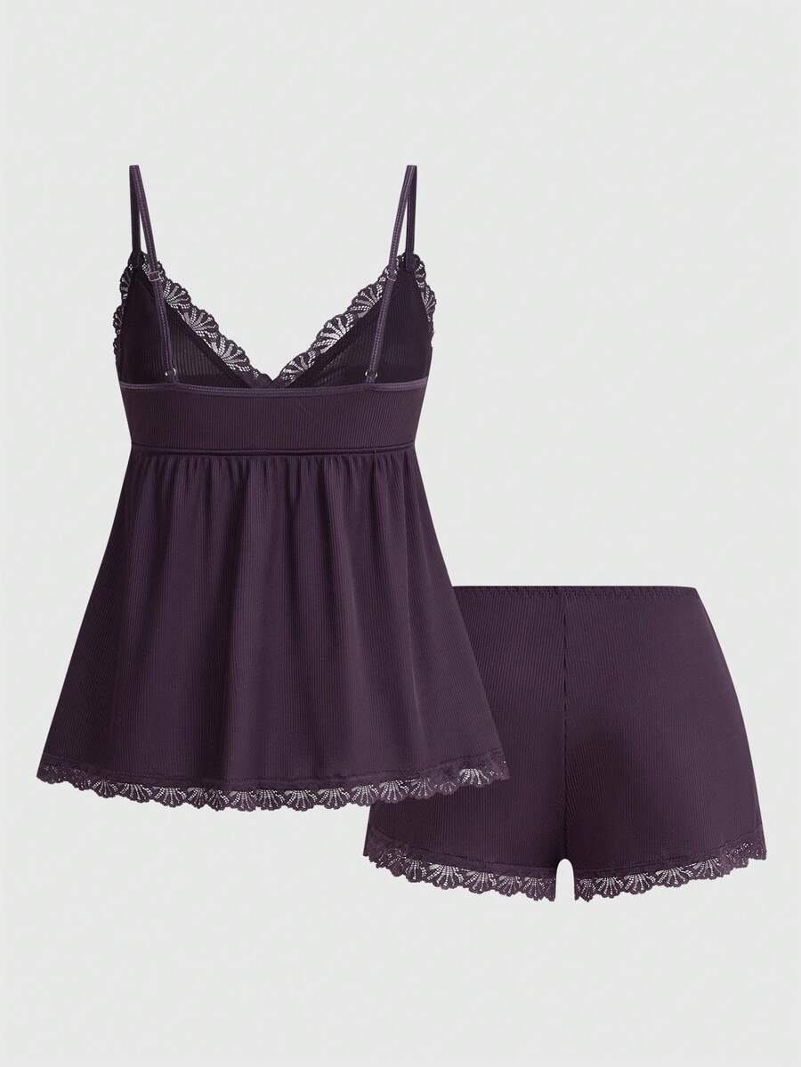 Ribbed lace camisole and shorts pajama set with spaghetti straps, bow detail, and contrast lace trim