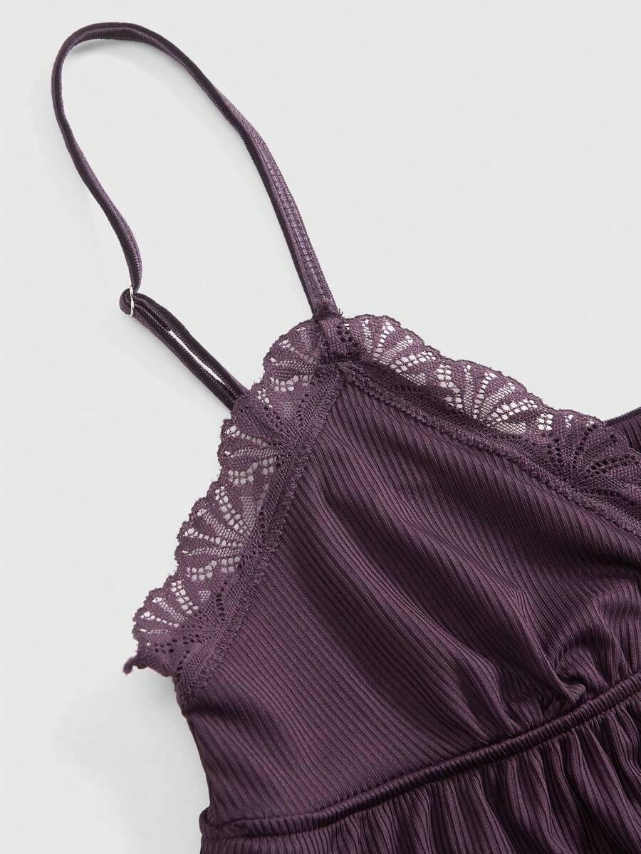 Ribbed lace camisole and shorts pajama set with spaghetti straps, bow detail, and contrast lace trim