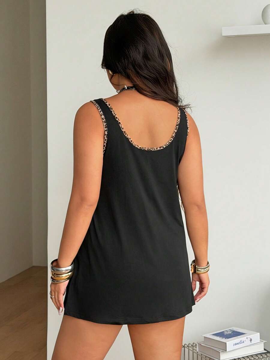 Women's camouflage print tank top featuring a scoop neckline and knitted stretch fabric in army green.