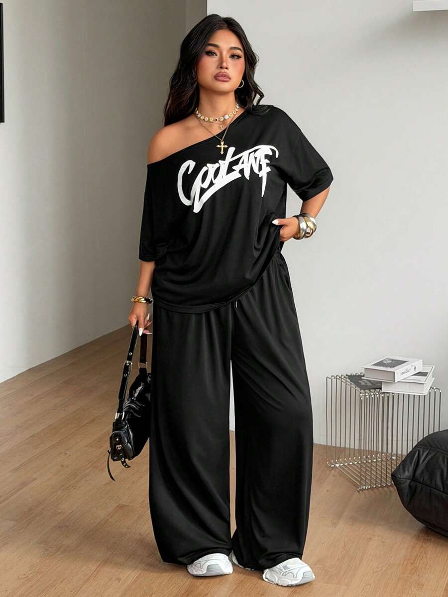 Women's two-piece lounge set featuring a loose drop shoulder asymmetrical neck short sleeve t-shirt and wide-leg knit pants with pockets.