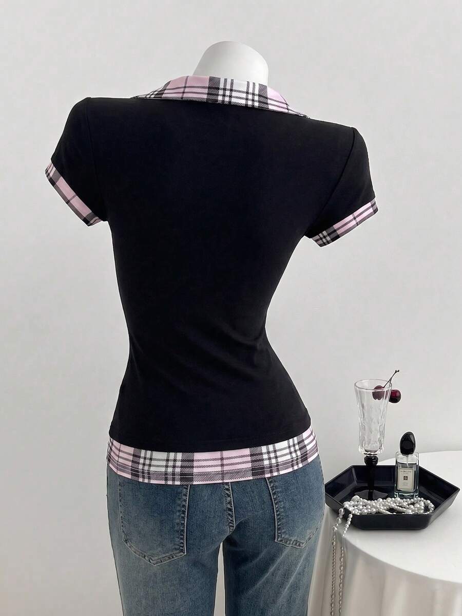 Women's black short sleeve slim fit 2-in-1 t-shirt with a plaid patchwork shirt collar detail.