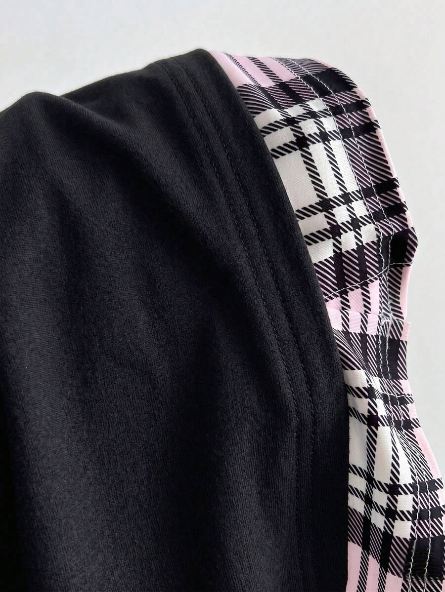 Women's black short sleeve slim fit 2-in-1 t-shirt with a plaid patchwork shirt collar detail.