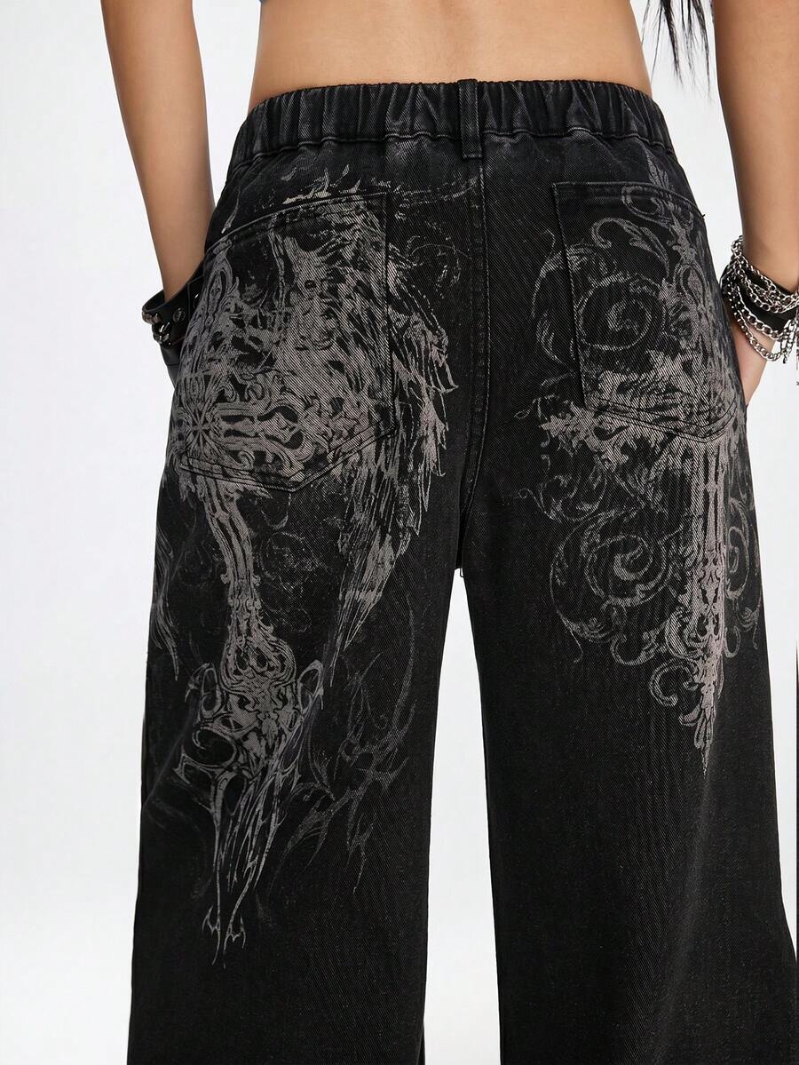 Women's gothic cross print baggy wide leg jeans made from denim with zipper fly and loose fit.