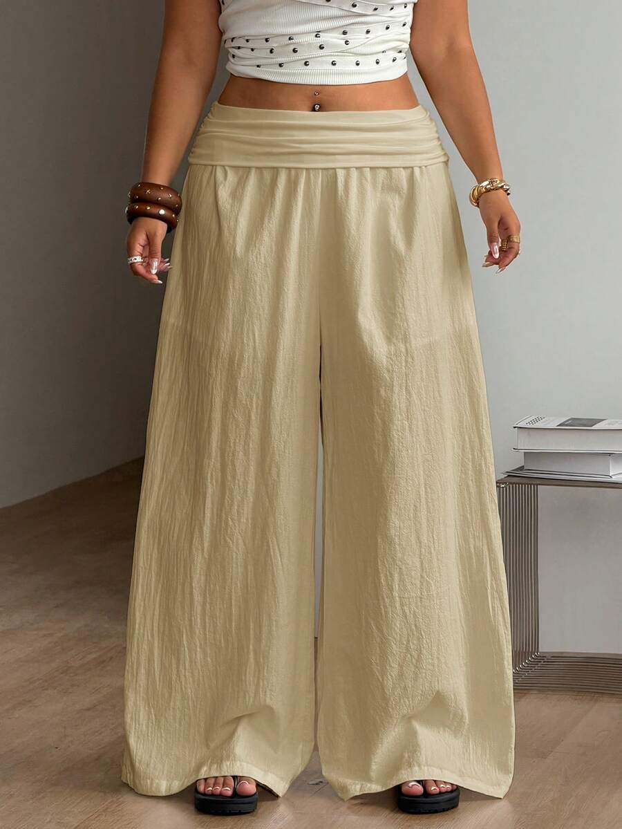 Apricot plus size wide leg pants made of 100% cotton with a high waist and relaxed loose fit.